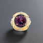 The front and top of the amethyst ring. Shows the large, round amethyst center stone.