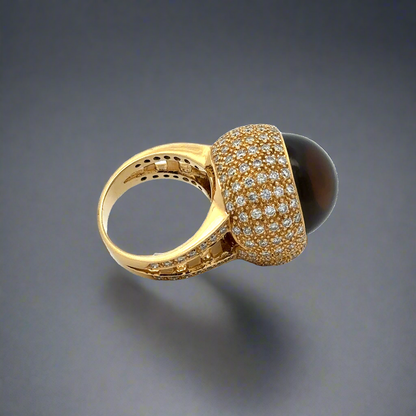 The back of the skull ring showing the diamonds, back of the gemstone, and the shank. Small scratches on the shank.