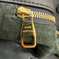 Gold zipper with light scratches