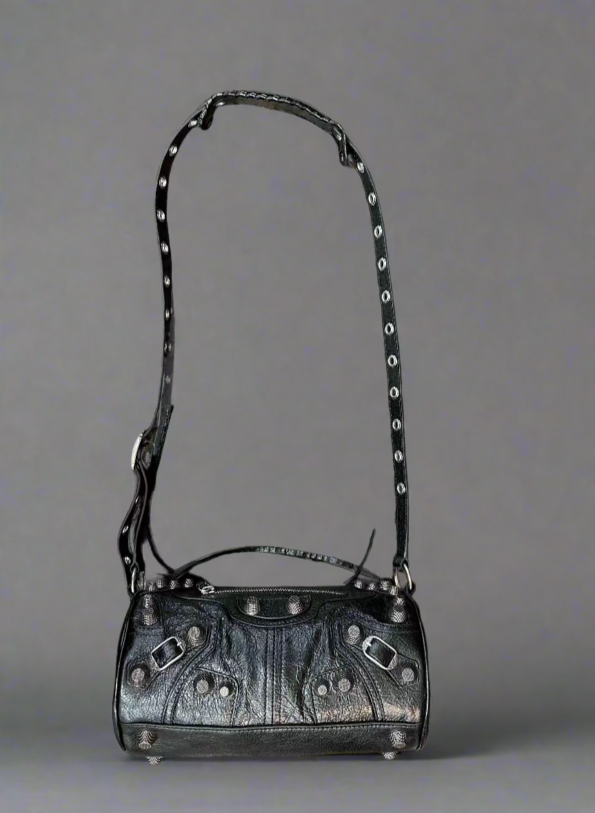 Purse with long shoulder strap stretched out