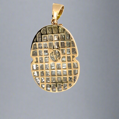 Back of pharaoh pendant. Shows "ag" and open back. Light scratches on barrel.