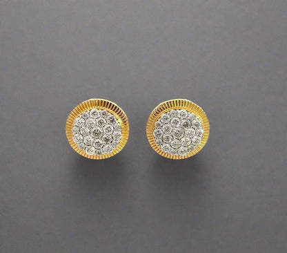 front of diamond earrings with a cluster of round diamonds and rolex-style bezel
