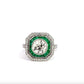 front of diamond ring with emerald gemstones