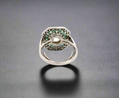 Back of ring with faint scratches on band. Ring guard in ring to hold it in place (can be removed)
