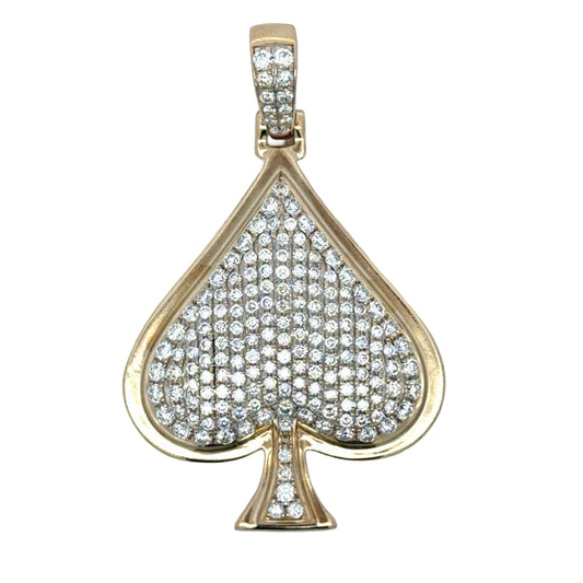 Gold pendant shaped like a spade with diamonds on a white background