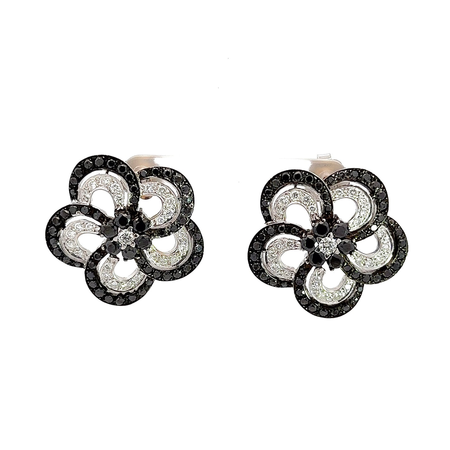Front of black + white round diamond flower earrings in white gold
