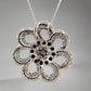 back of flower necklace in white gold