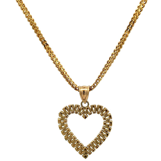 yellow gold square franco chain with a rolex heart pendant