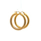 diagonal view of polished yellow gold hoops