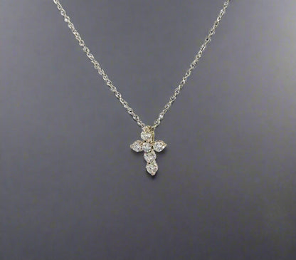 diagonal view of diamond cross necklace