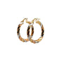 Diagonal view of tri-color gold hoops