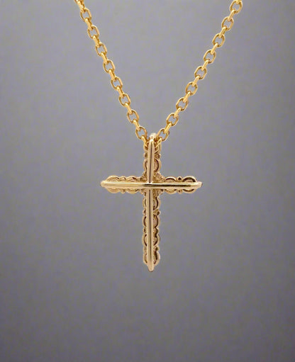 back of yellow gold cross necklace