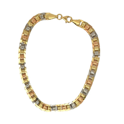 Back of tri-color gold bracelet on white background