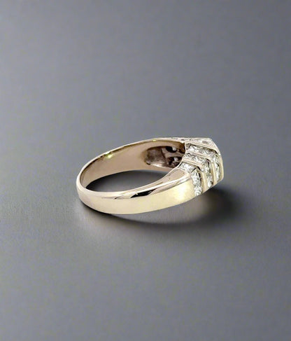 side of white gold ring with small scratch on gold
