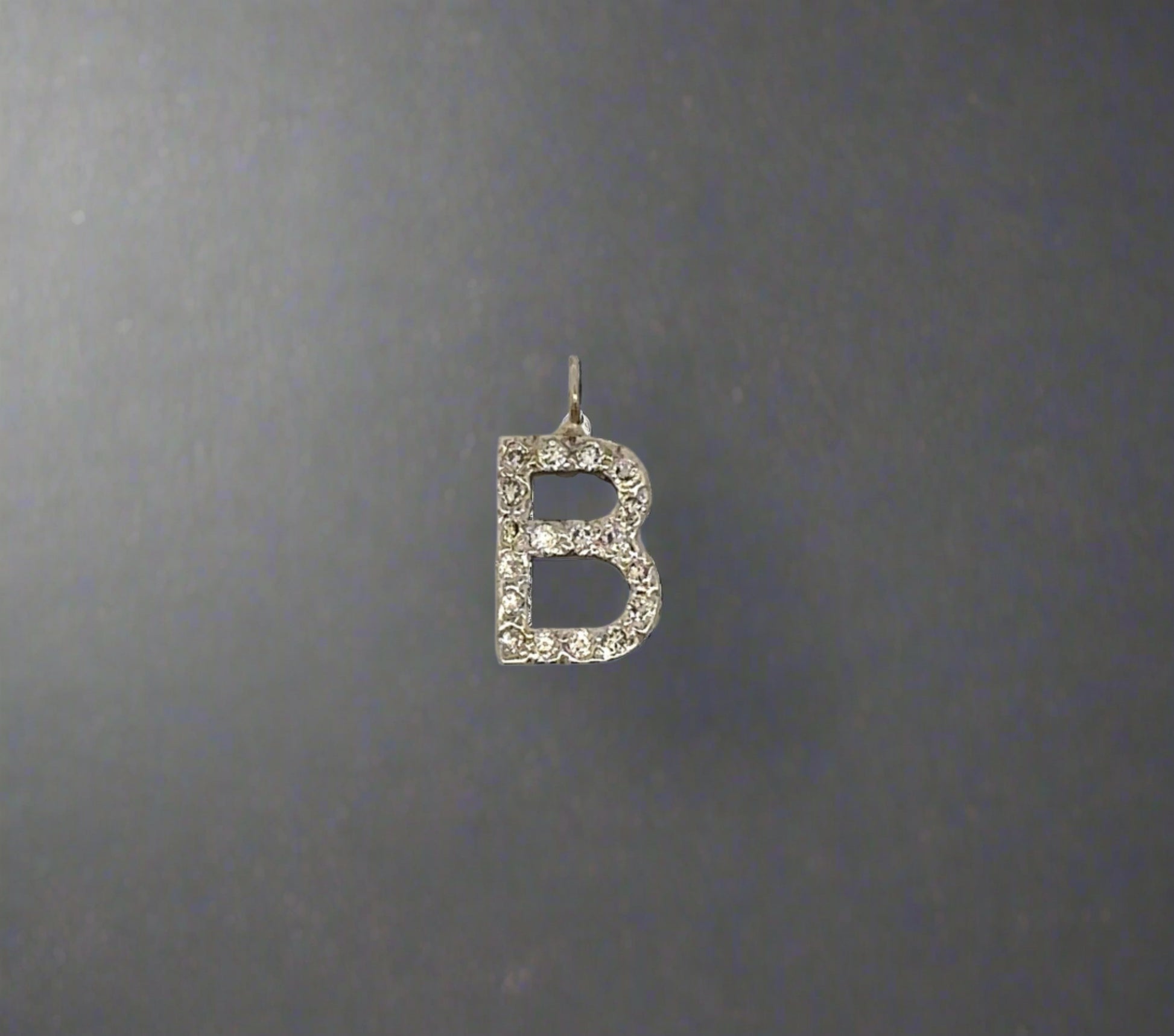 Front of diamond B pendant