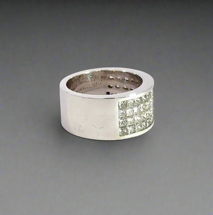 side of white gold ring with scratches on gold