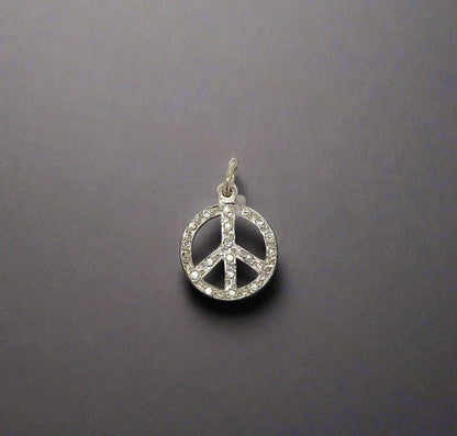 Front of diamond peace sign pendant
