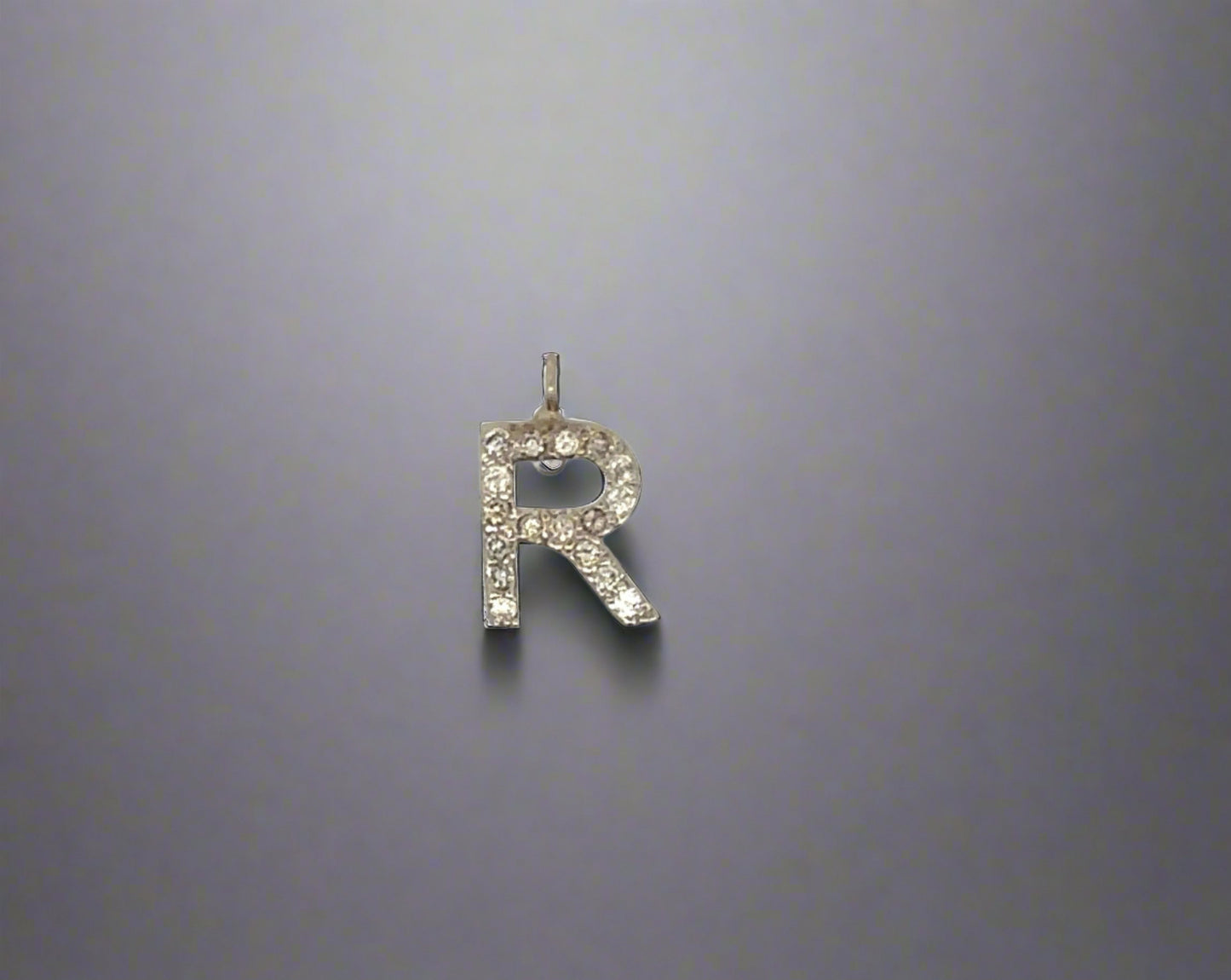 Front of diamond R pendant