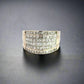 front of white gold ring with 6 rows of princess-cut diamonds on the front