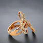 Side of rose gold diamond bow ring