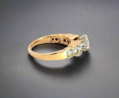 Side of yellow gold ring with scratches on band