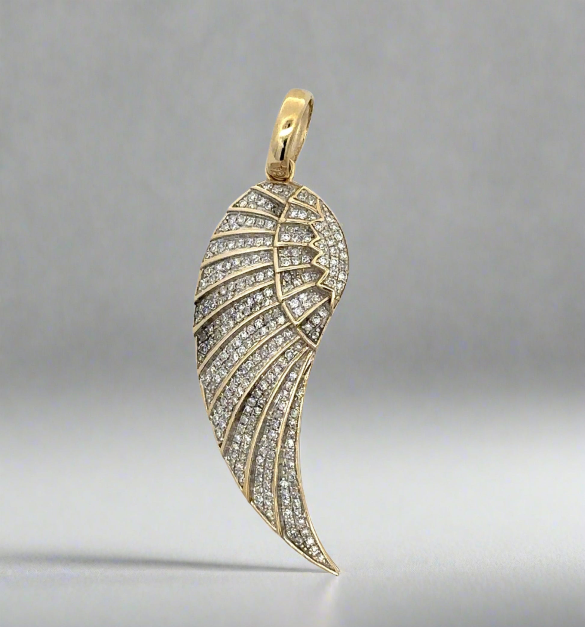 Front of diamond angel wing pendant