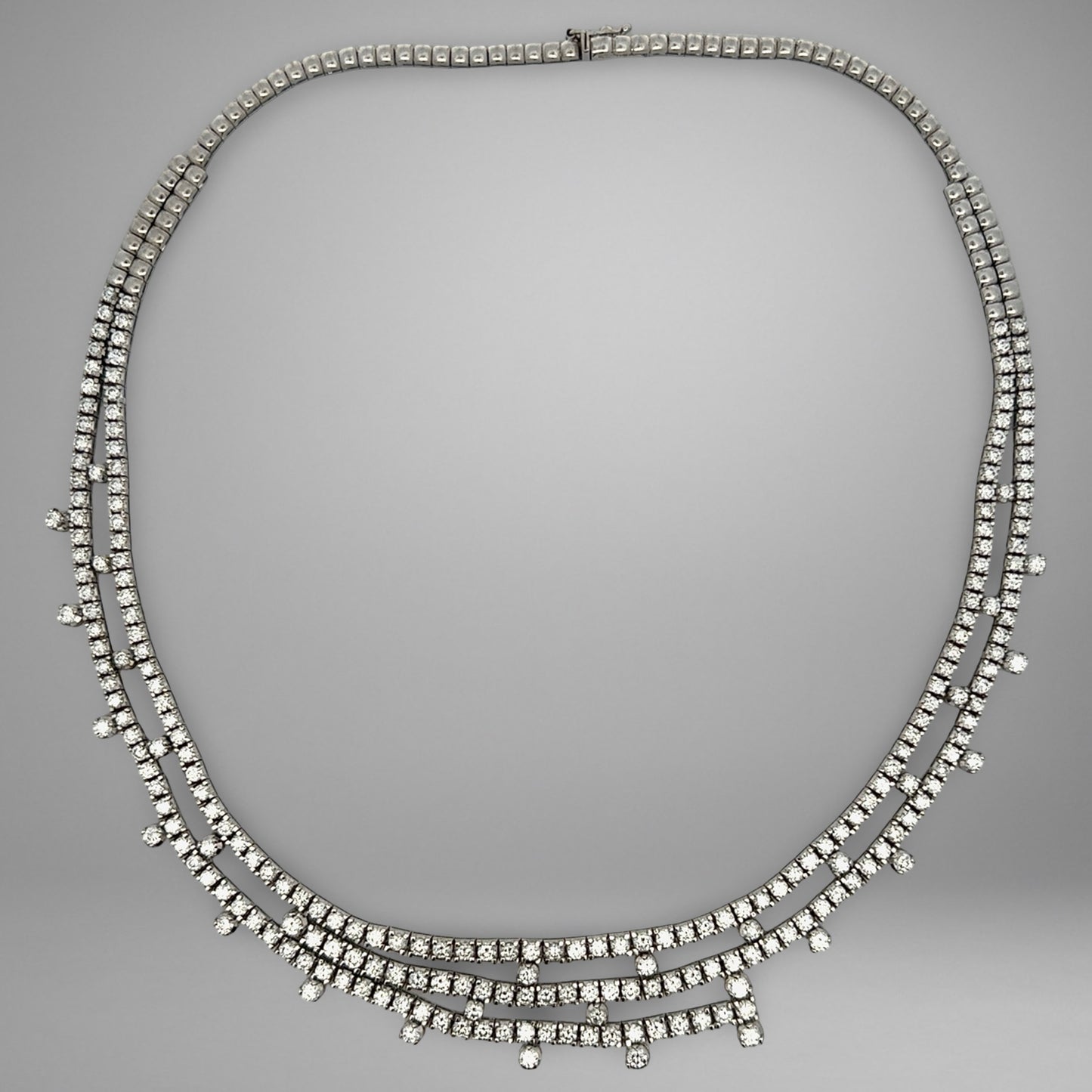 Diamond necklace on a gray background