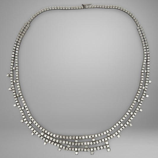 Diamond necklace on a gray background