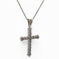 white cross pendant necklace on a white background