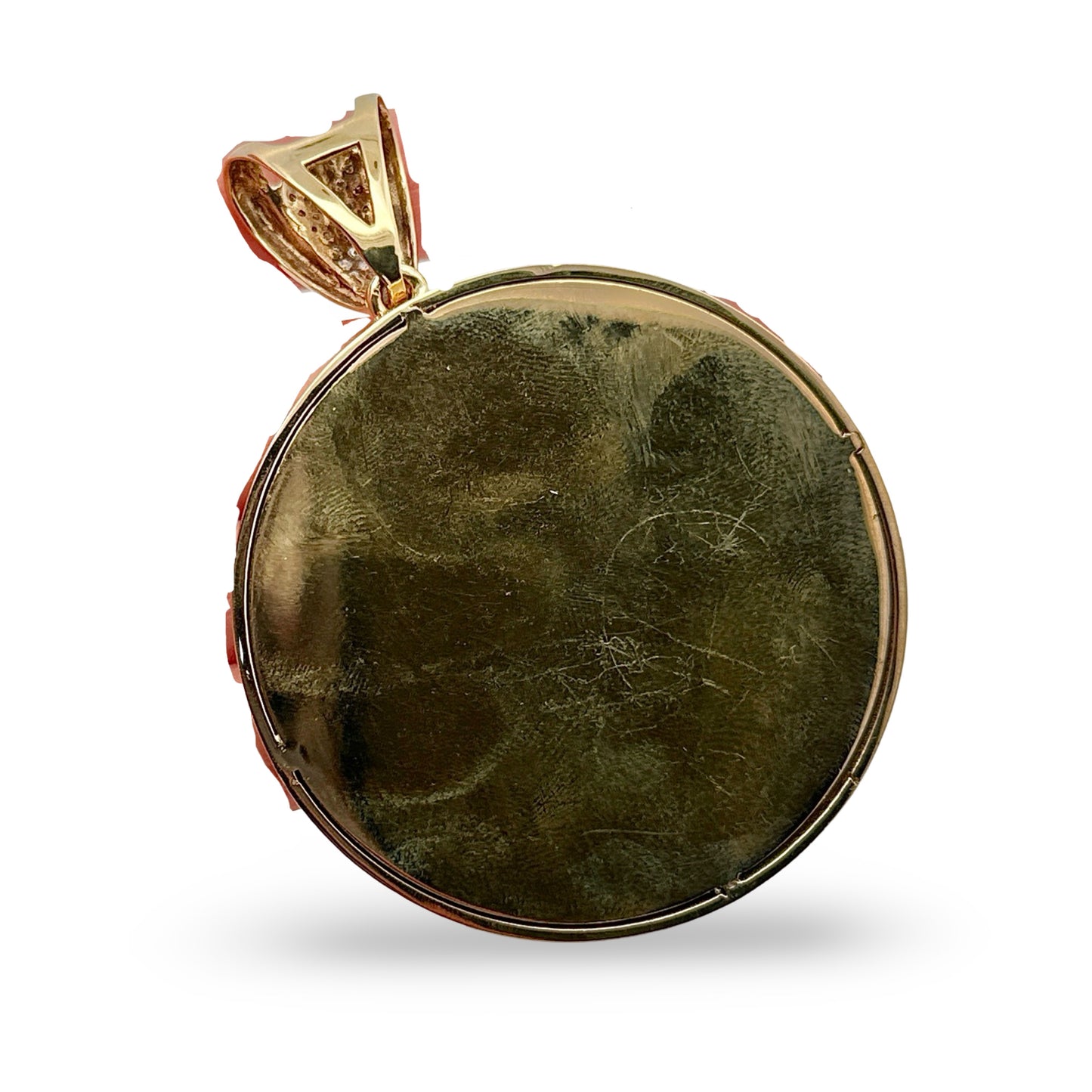 Back of pendant showing scratches