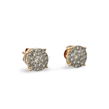 Pair of diamond stud earrings on a white background