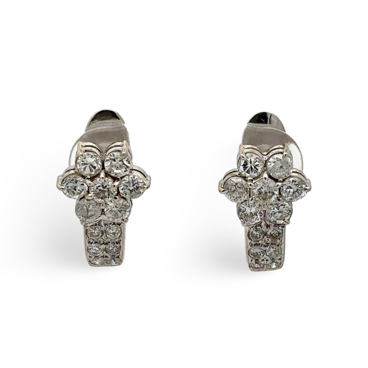 Pair of diamond earrings on a white background