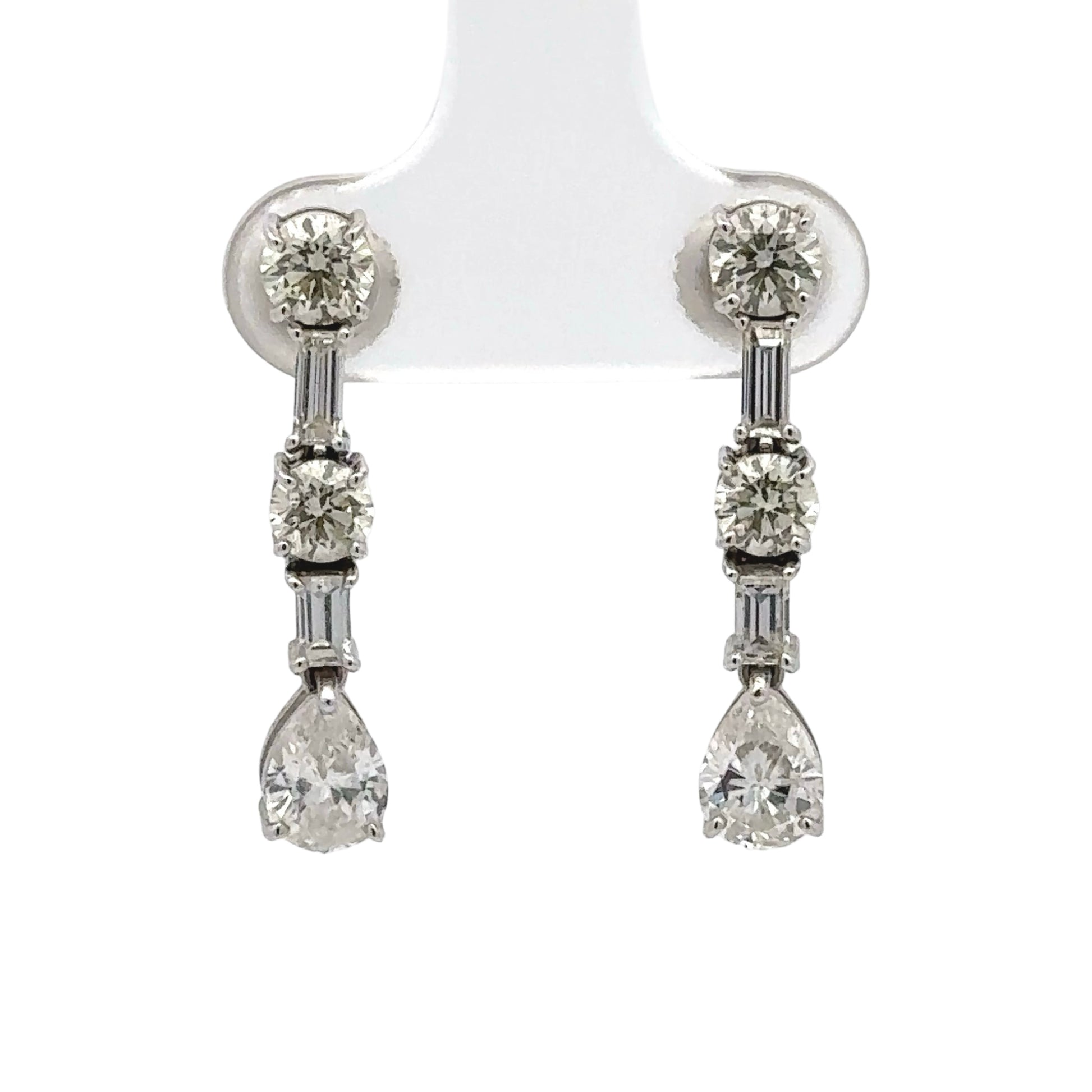 Diamond earrings on a white background