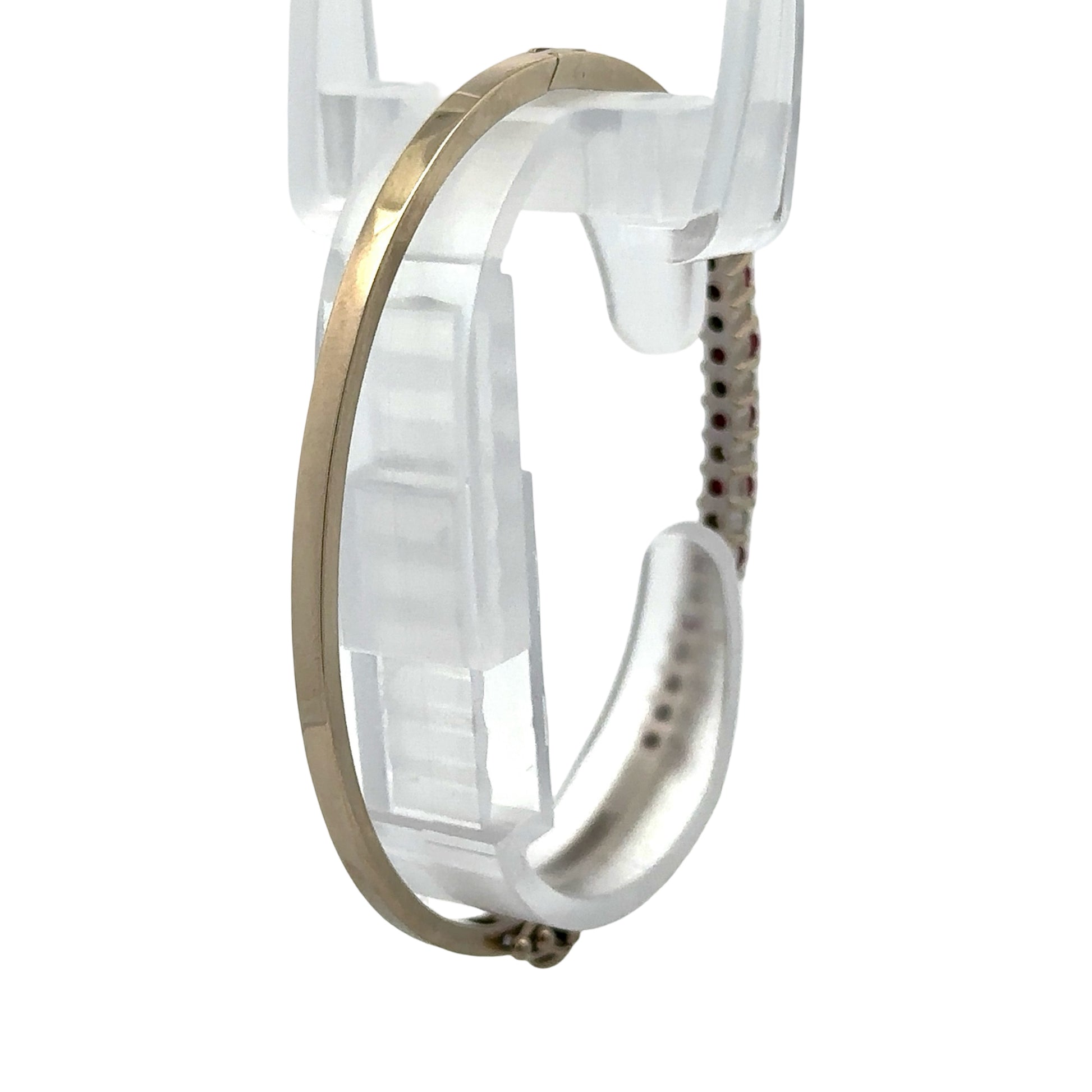 Back of white gold bracelet on a bracelet form