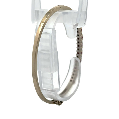 Back of white gold bracelet on a bracelet form