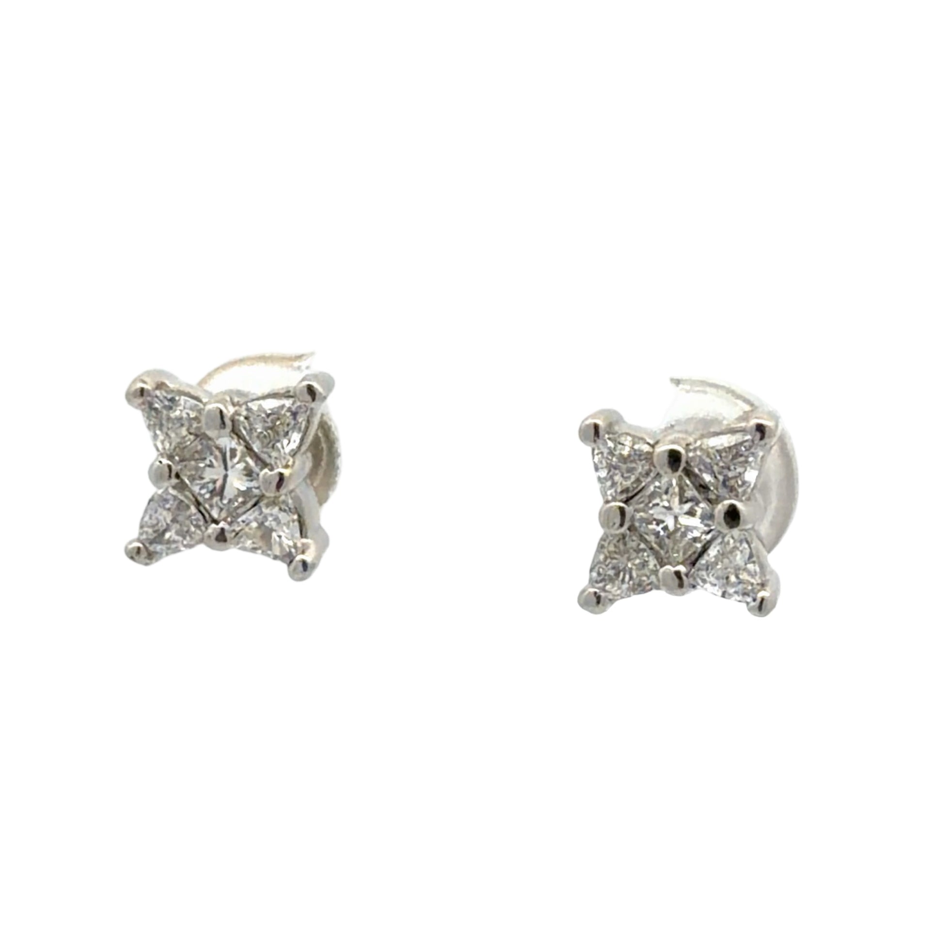 Pair of diamond stud earrings on a white background