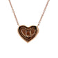 Heart-shaped pendant necklace on a white background with 14K stamp and KPJ stamp