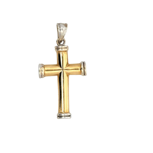Front of yellow and white gold cross pendant with yellow gold cross and white gold border on top, bottom, and sides and white gold bail. Scratches on gold