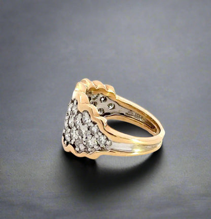 side of yellow and white gold ring with 14K stamp on inside