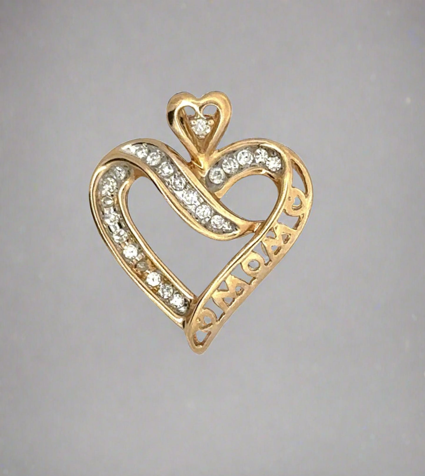 Yellow Gold Mom Diamond Heart Pendant with Heart-shaped bail and diamonds on outline. Mom is in gold detail on side