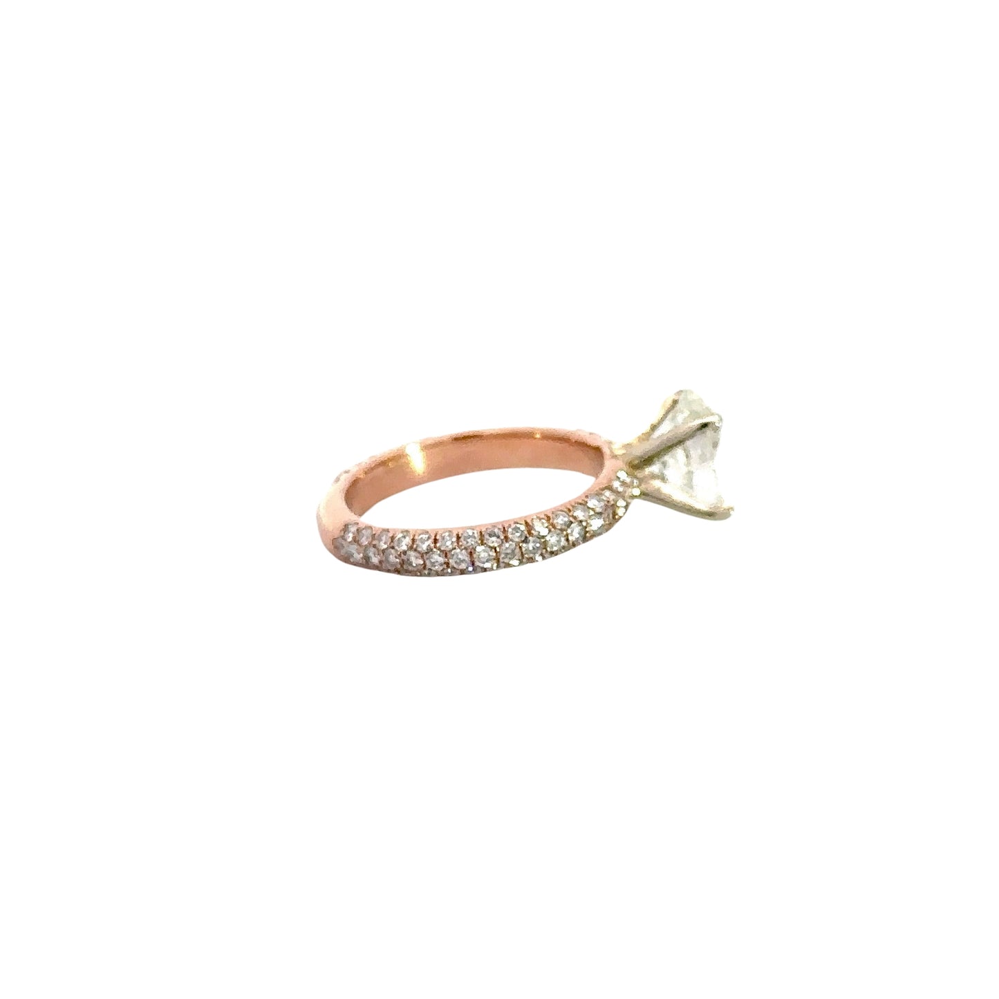 Side of rose gold ring with 3 rows of small round diamonds on the band