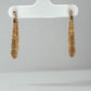 Front of yellow gold bamboo hoop earrings