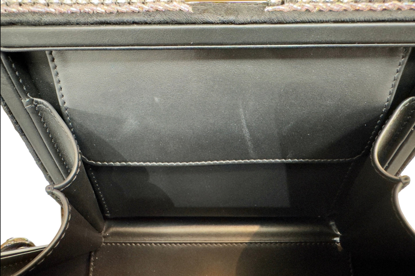 Inside of bag with scuff mark on the flap