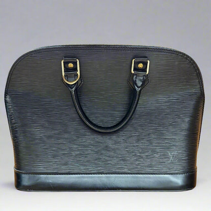 Front of black leather textured bag with 2 top handles