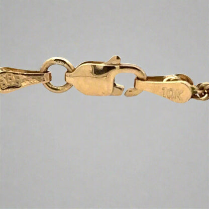 10K yellow gold lobster clasp with scratches on clasp