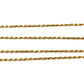 Close up of thin yellow gold rope chain