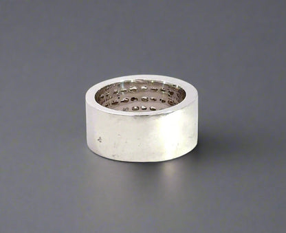 back of white gold ring with scratches and marks on gold