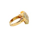 side of yellow gold heart ring with a scratch on the shank