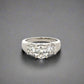 Front of 3 stone round diamond ring