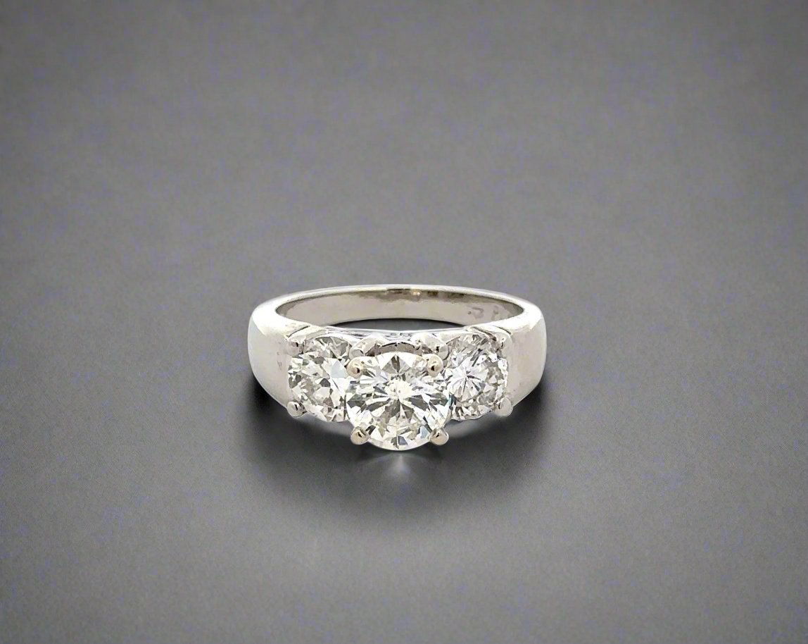 Front of 3 stone round diamond ring